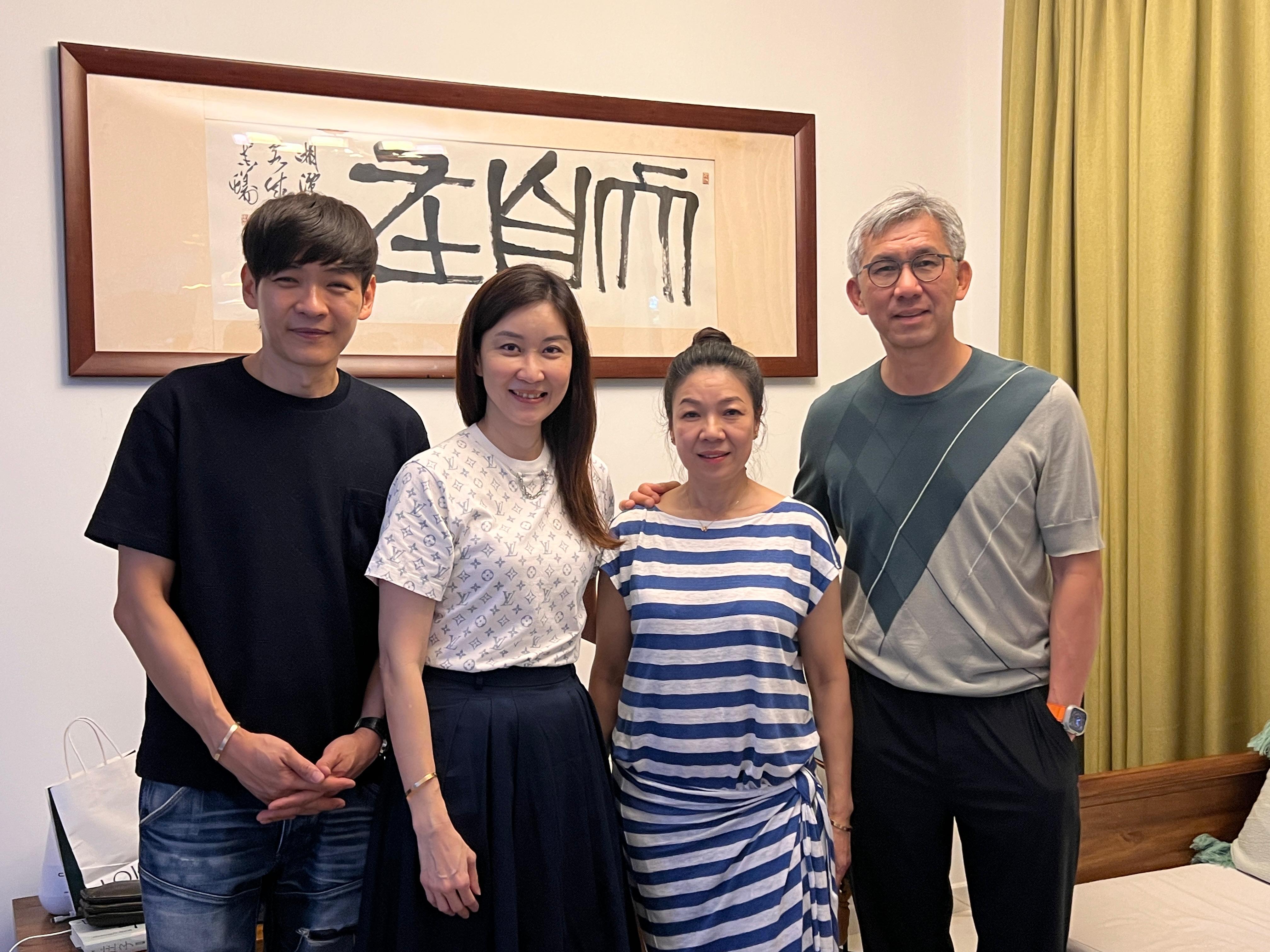 Kelly and Mark with client